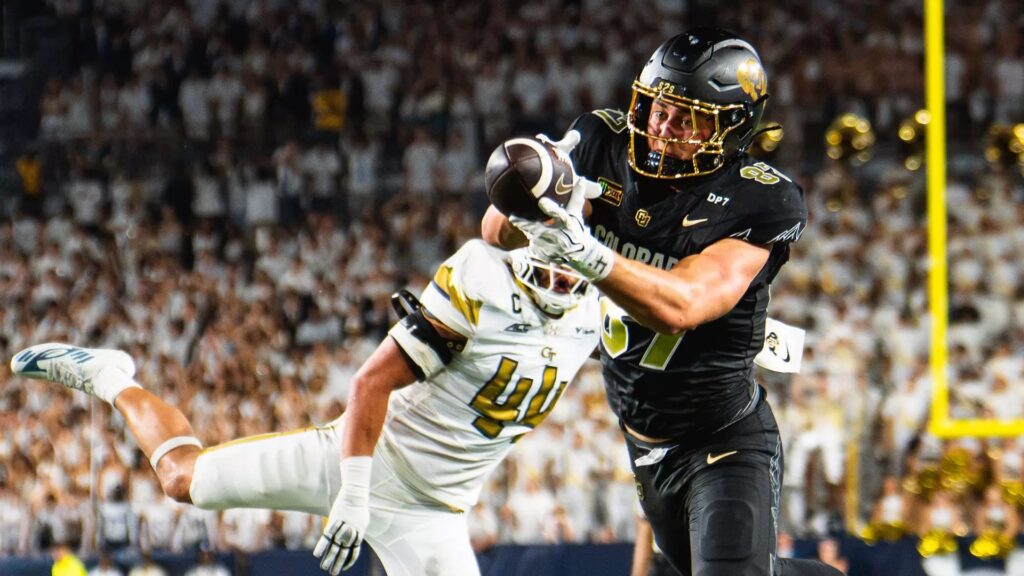 Colorado tight end Charlie Williams catches the game-winning 20-yard touchdown pass over a Georgia Tech defender at Bobby Dodd Stadium.