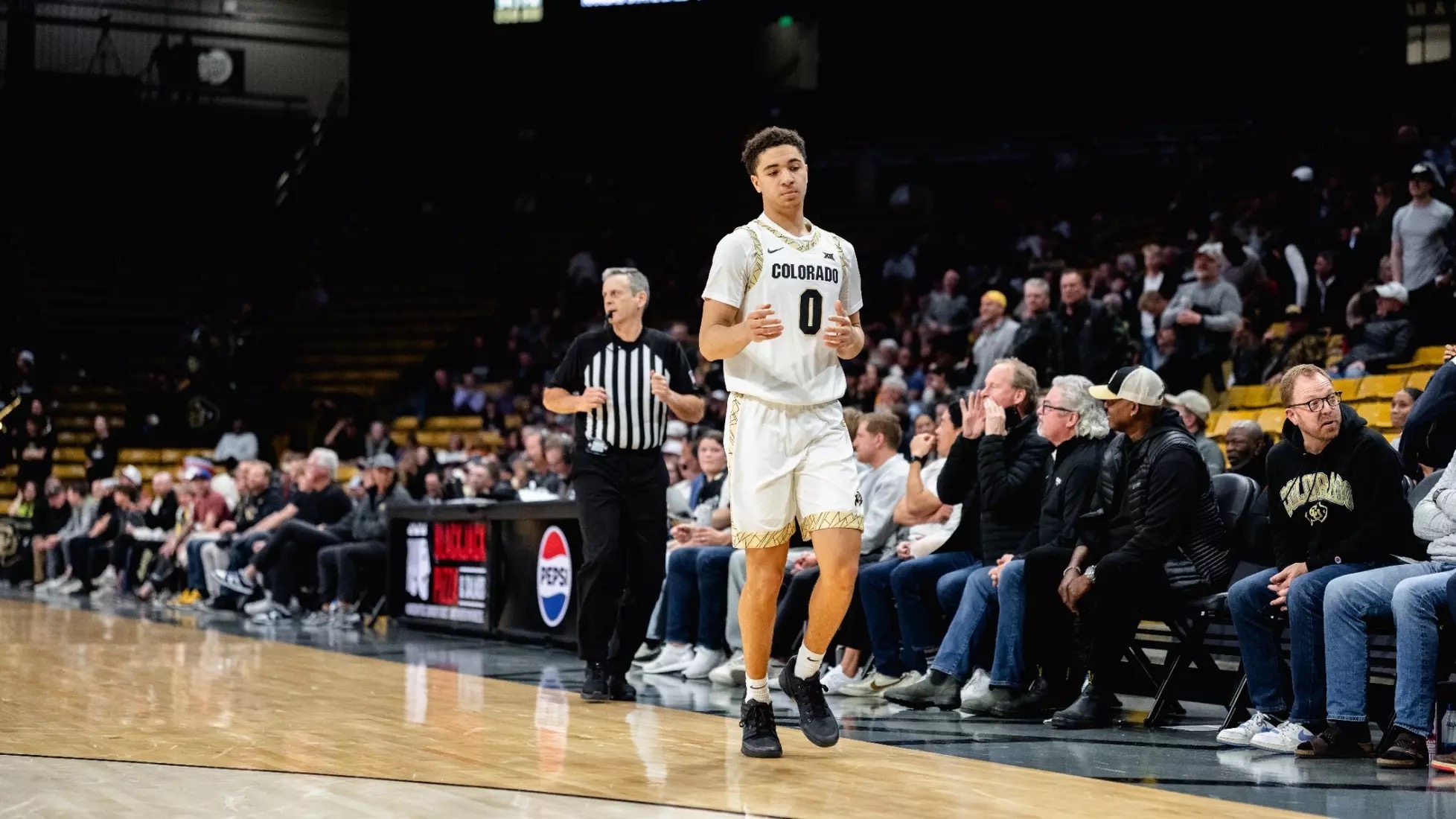Colorado guard Ian Inman runs back up the floor during a game at the CU Events Center.